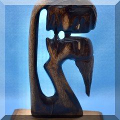 D69. Wood carved kiss sculpture. 9”h - $18 